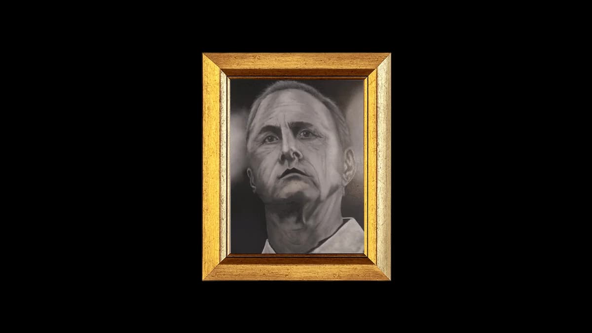 Ingelijst portret van Johan Cruijff dat bij de balie van Onder de Linden hangt